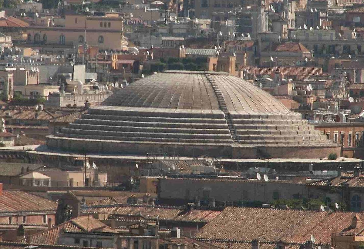Exterior view of the Pantheon rotunda with thick masonry walls in Rome.