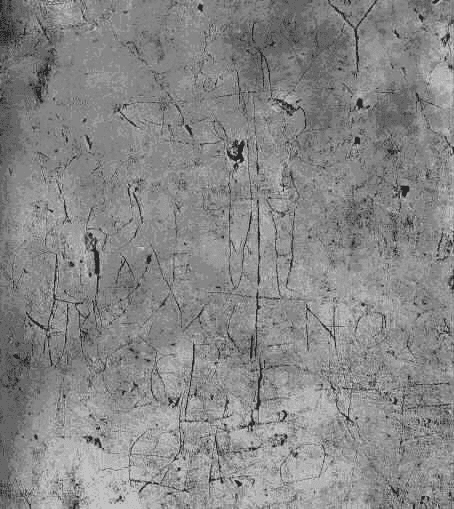The Alexamenos graffito—mocking sketch of a donkey-headed crucified figure with Greek caption—scratched into plaster on the Palatine.