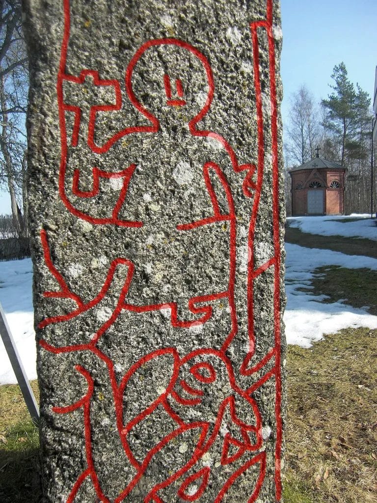 Altuna runestone: Thor stands in a boat, hammer raised; the serpent rises with the hook set in its jaw.