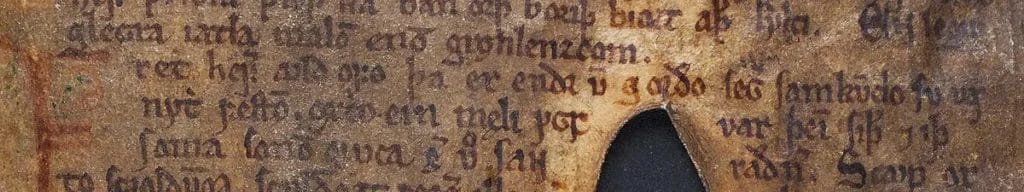 Folio from Codex Regius with black-ink text lines and rubricated initials, opening the poem Atlamál.