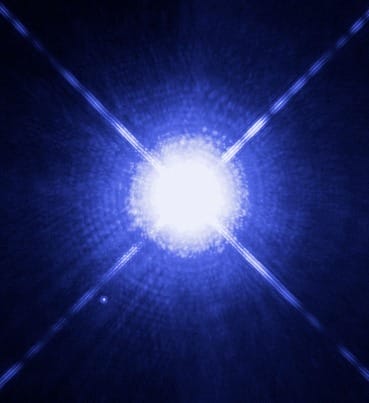 Hubble image showing bright Sirius A with faint white dwarf companion Sirius B