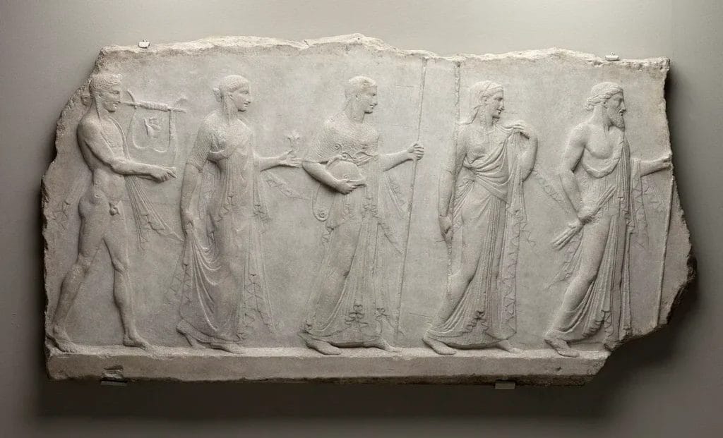 Zeus flanked by Athena and Apollo on relief