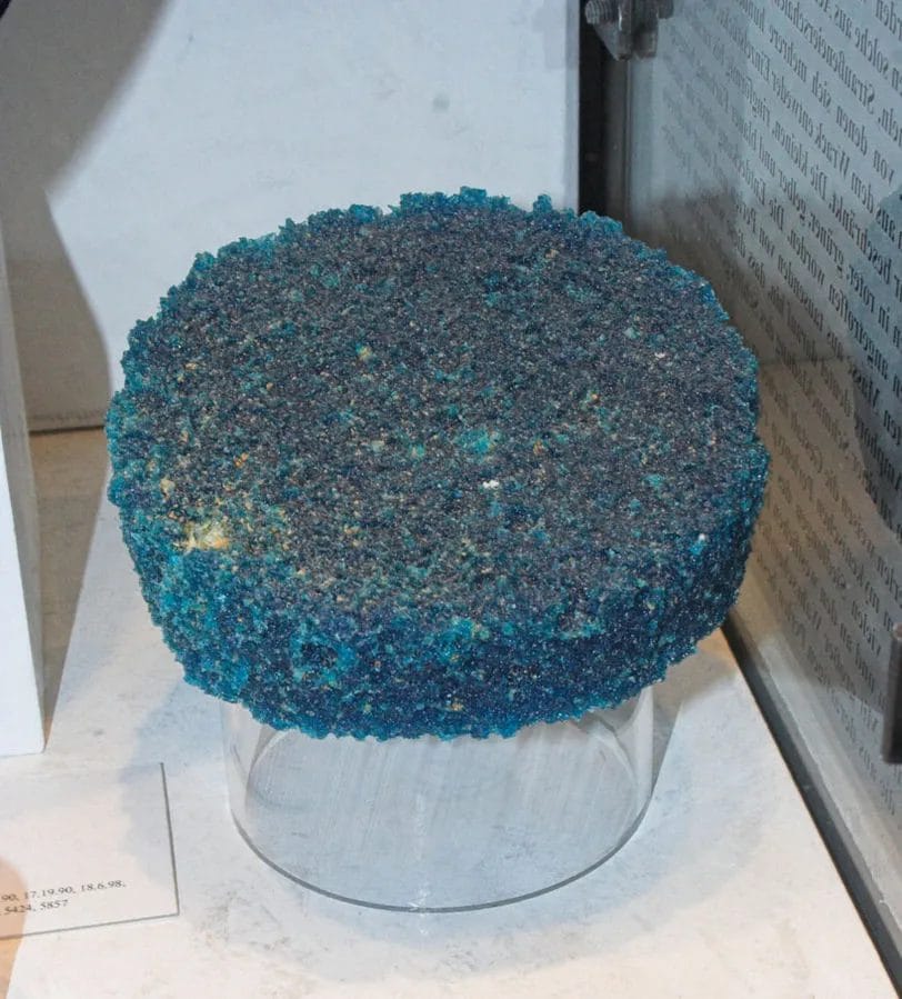 Close view of a cobalt-blue discoid glass ingot recovered from the Uluburun wreck.