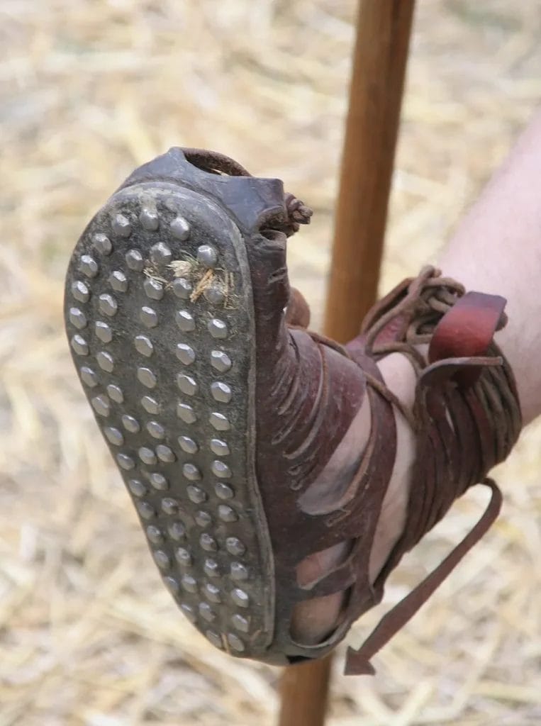 underside view of caligae showing nail heads across the sole