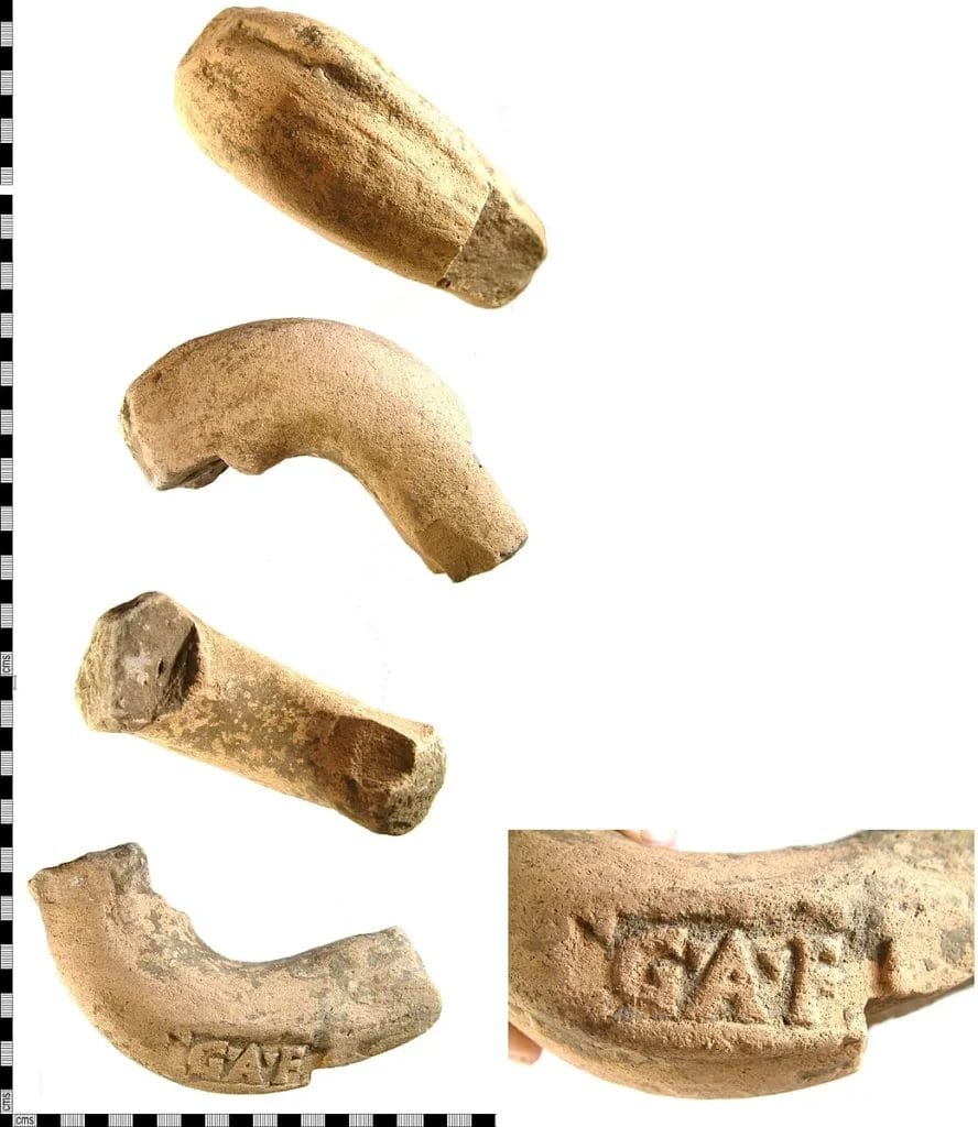 Detail of a thick amphora handle showing stamped letters