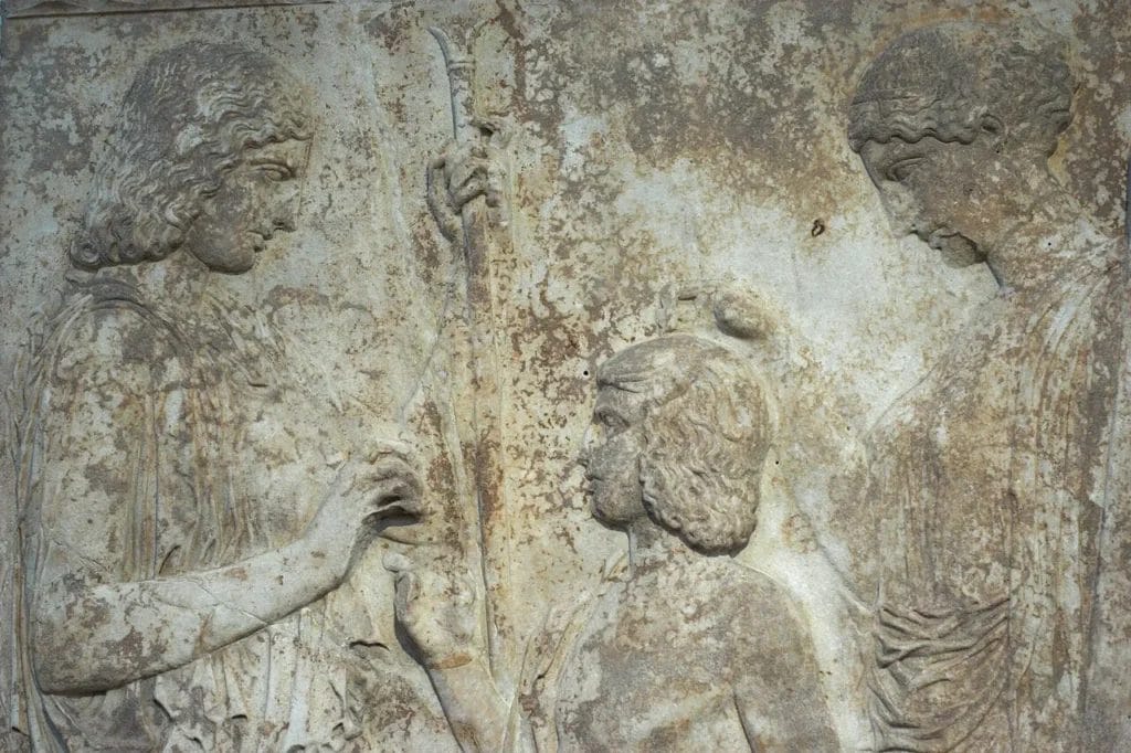 Pentelic marble relief showing Demeter at left, Triptolemos in center, Persephone at right, NAMA 126.