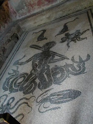Mosaic depiction of Triton with fish tail