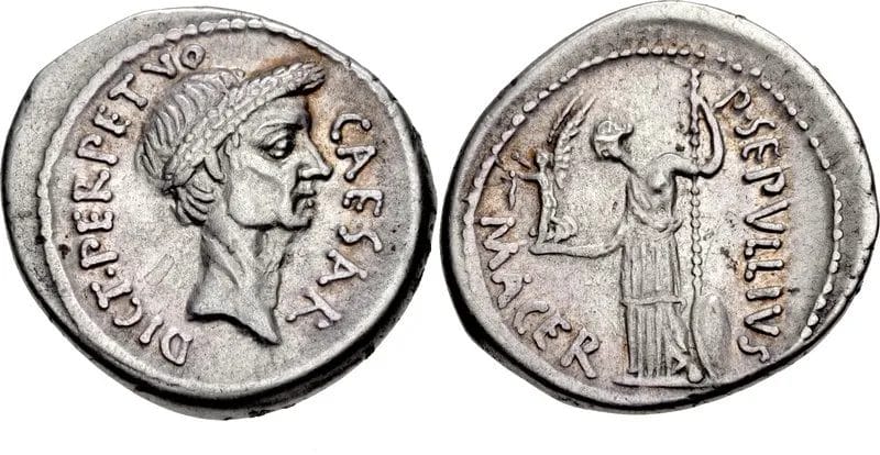 Silver denarius with wreathed portrait of Caesar and legend CAESAR on obverse
