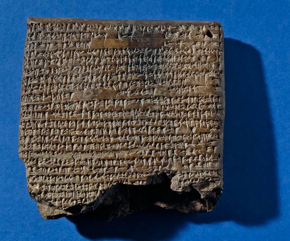 Clay tablet with cuneiform script on display at the British Museum, dated to about 2040 BCE.