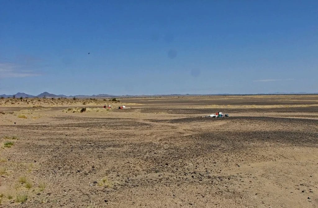 Wide view of the Nataruk excavation area near Lake Turkana, a prehistory camp where multiple individuals died violently; helpful for situating discussions of forager warfare evidence.