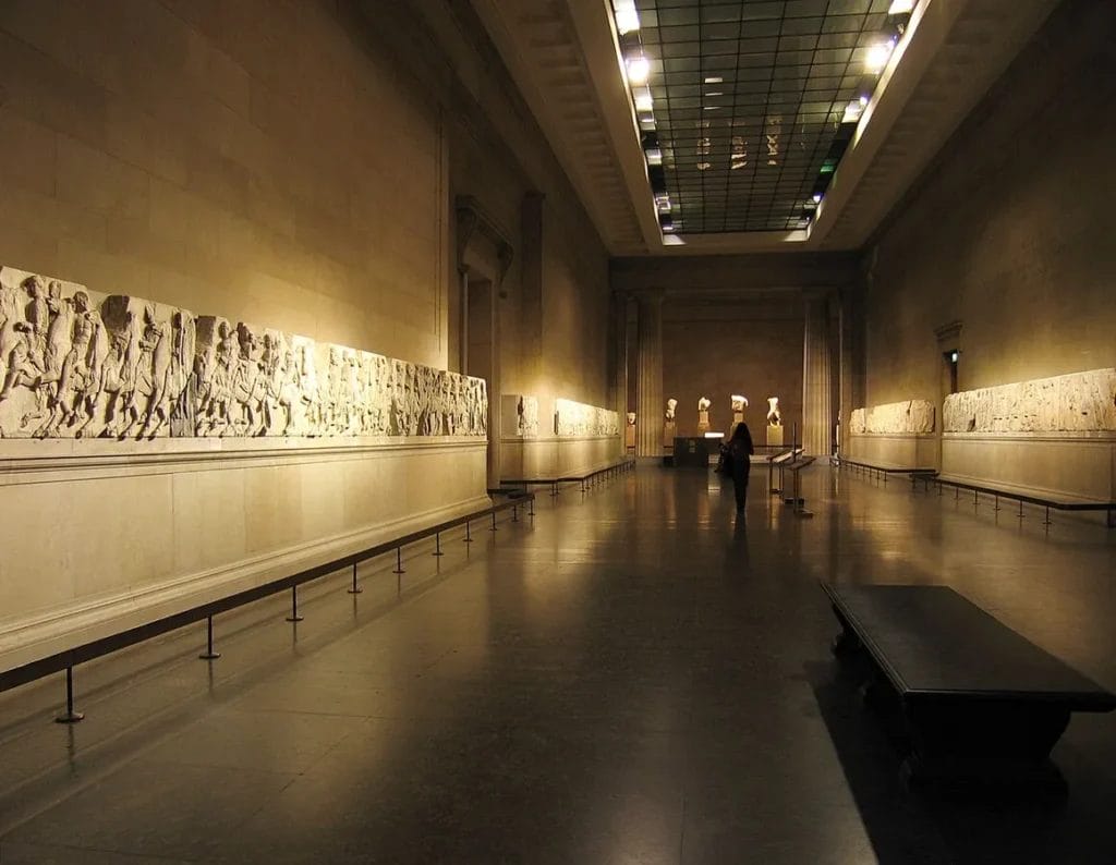 Gallery view of the Parthenon Marbles displayed in London.