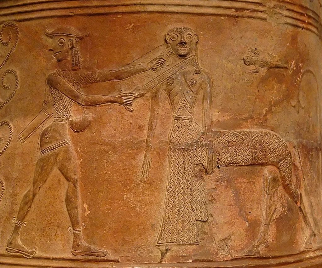 Perseus holds Medusa’s head on relief