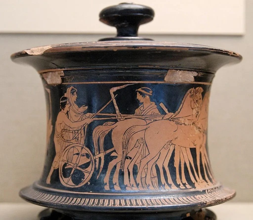 Detail of a red-figure pyxis with bride in chariot in wedding procession.