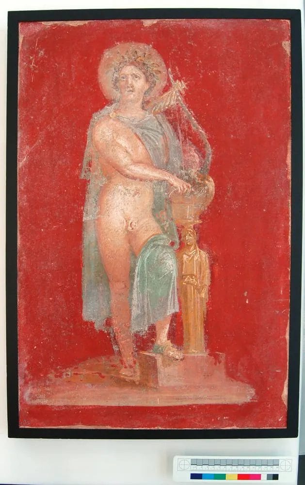 Roman fresco fragment showing Apollo wearing long green cloak with classical drapery and pose