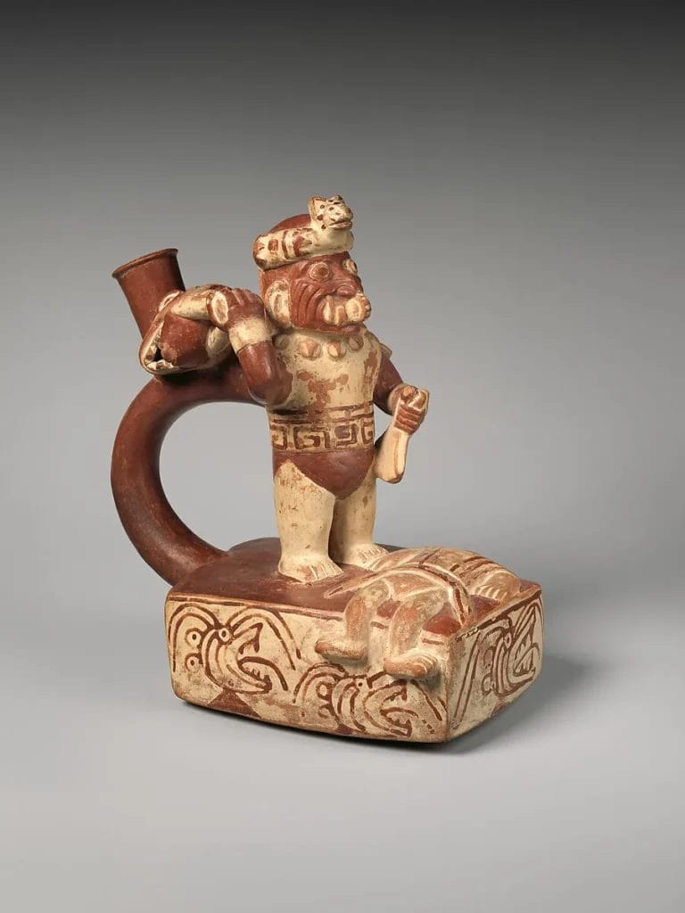 Moche decapitation scene stirrup spout bottle deity with tumi
