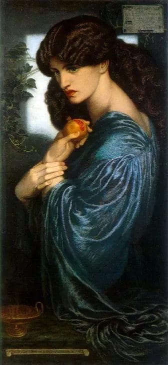 Portrait of young Goddess of Spring Persephone holding pomegranate in dark setting
