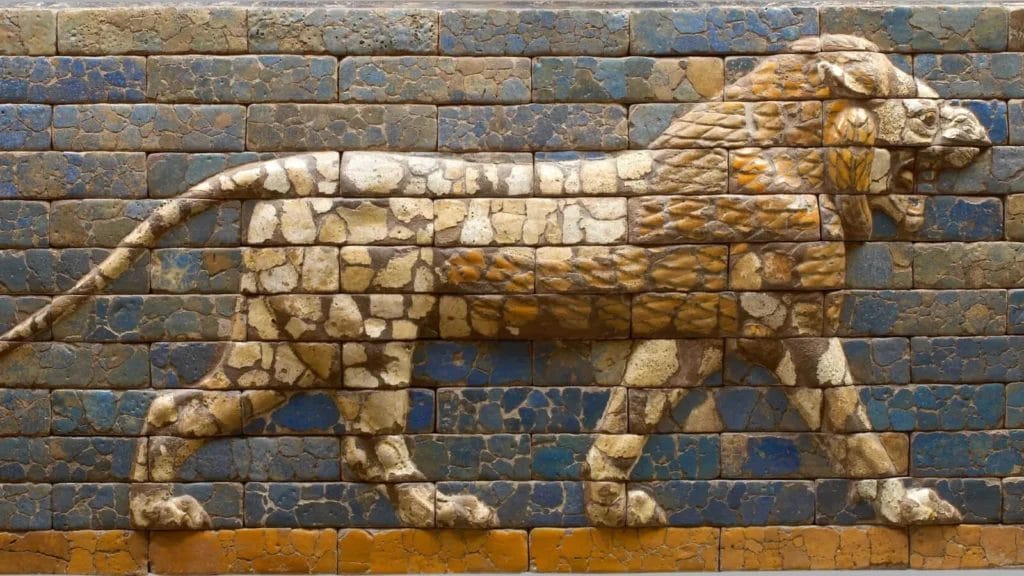 Glazed brick relief of a striding lion from Babylon’s Ishtar Gate, emblem of royal power and processional display