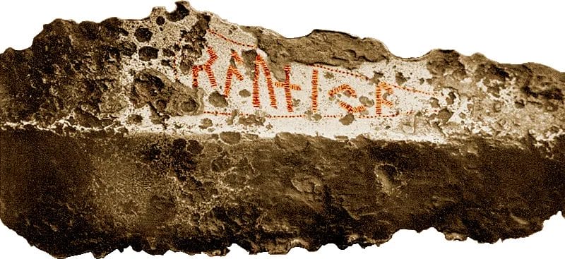 Iron spearhead from Norway with Norse runes carved along the blade identifying the weapon's name or owner from the second century CE.
