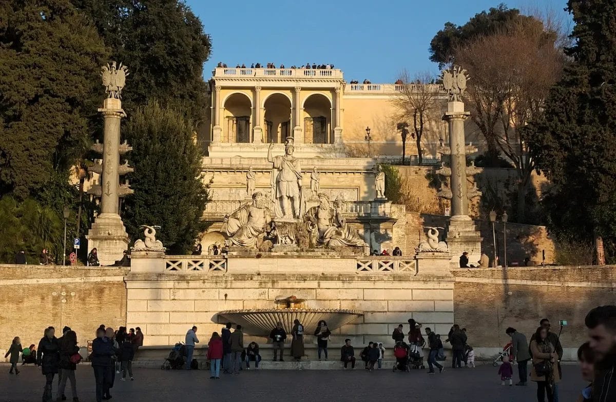 Piazza del Popolo in Rome showing the central obelisk, twin churches, and Porta del Popolo gate, sights to see in Rome