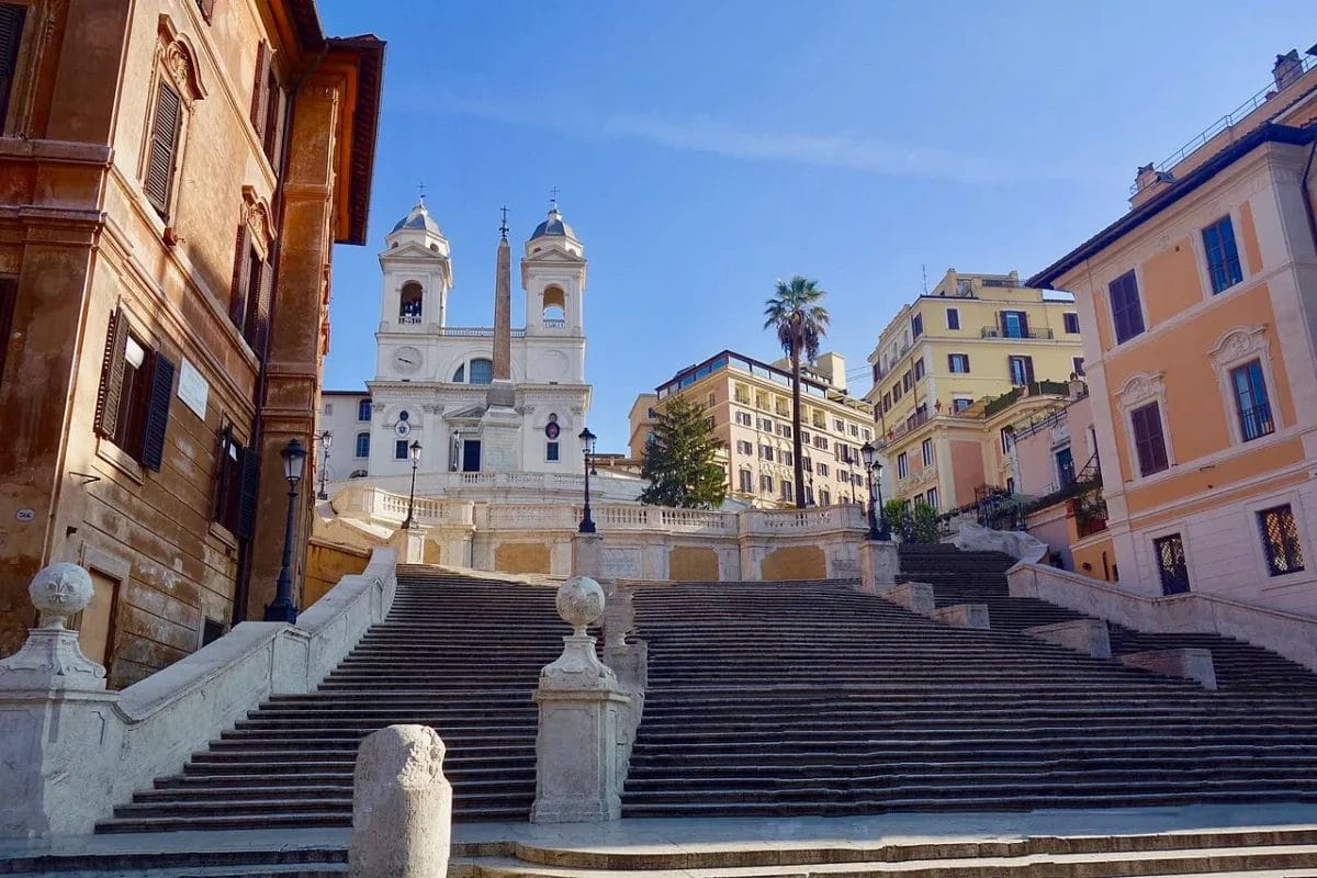 The Spanish Steps in Rome viewed from the top looking down toward the Barcaccia fountain and Piazza di Spagna, sights to see in Rome