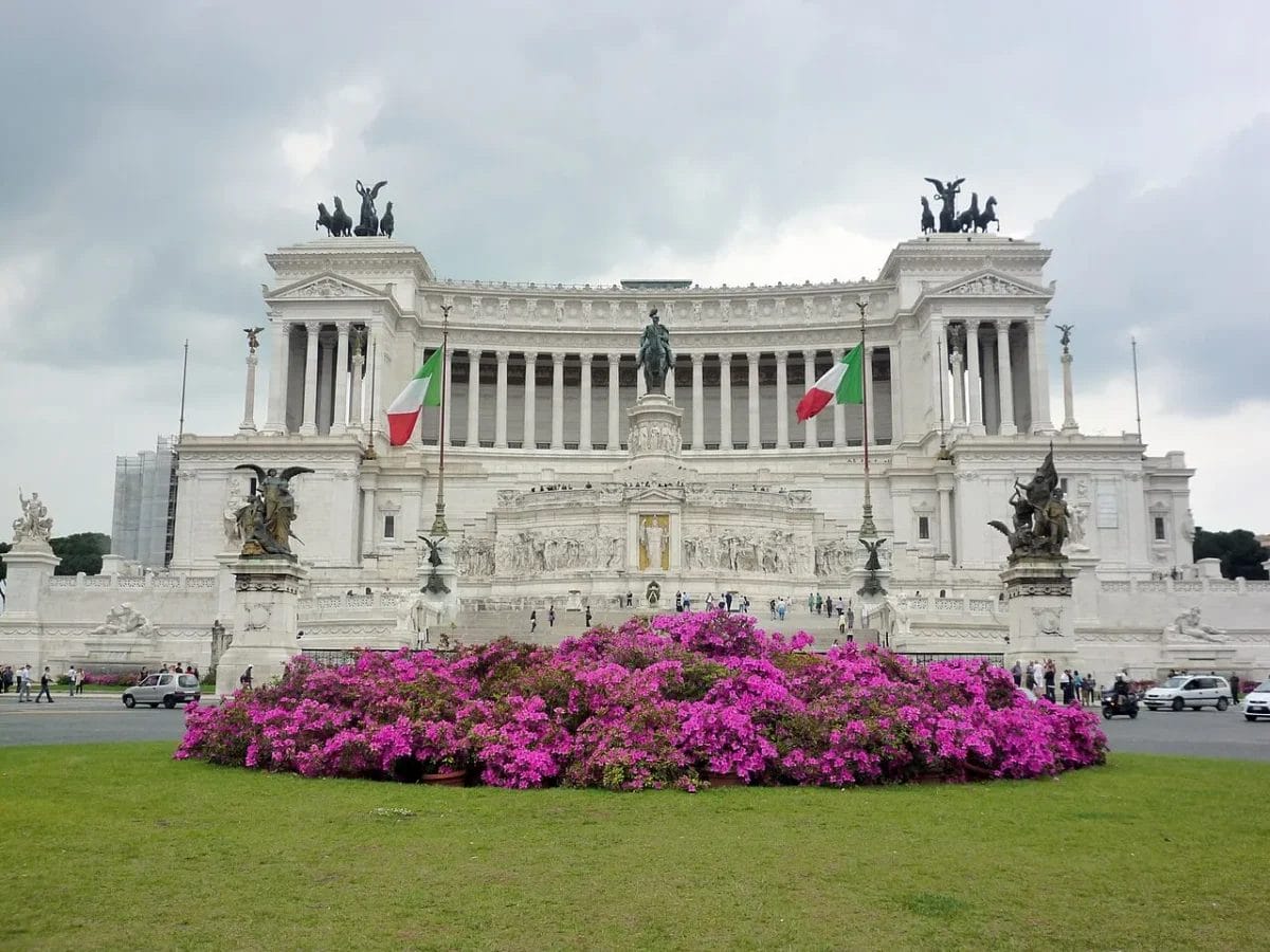 The Vittoriano monument in Rome with its white Botticino marble colonnades and gilded chariot groups, sights to see in Rome