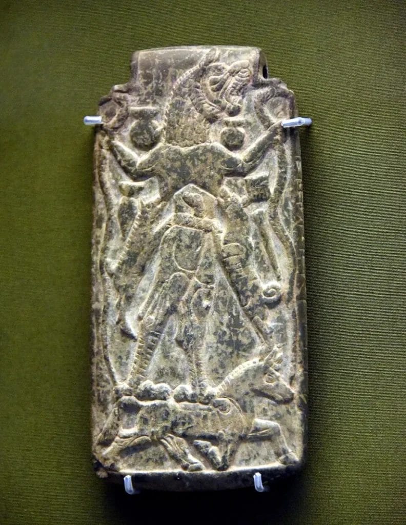 Lamashtu demon stands on a donkey with animals and cuneiform, linking her to threats against mothers and infants